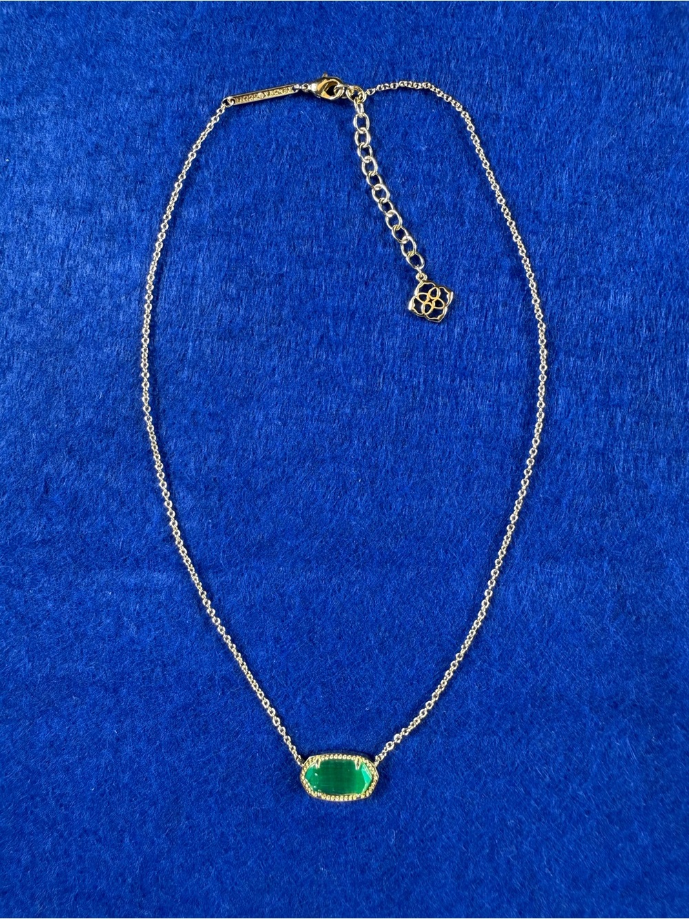 Kendra Scott Elisa Gold pendant necklace in Emerald Cat’s Eye.